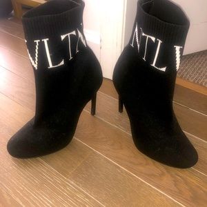 Non authentic YSL sock botties in black knit with white ysl logo . Size 6